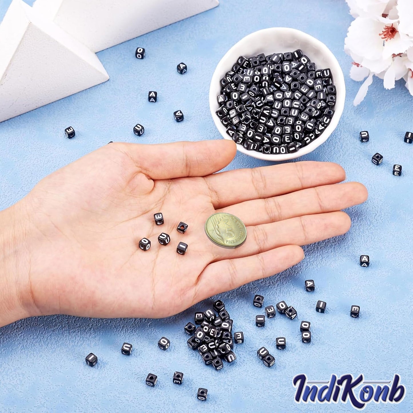 Use white black 6 mm and 6mm beads to finish DIY jewellery projects, beading craft and decorative craft finishing with a neat decorative finish.