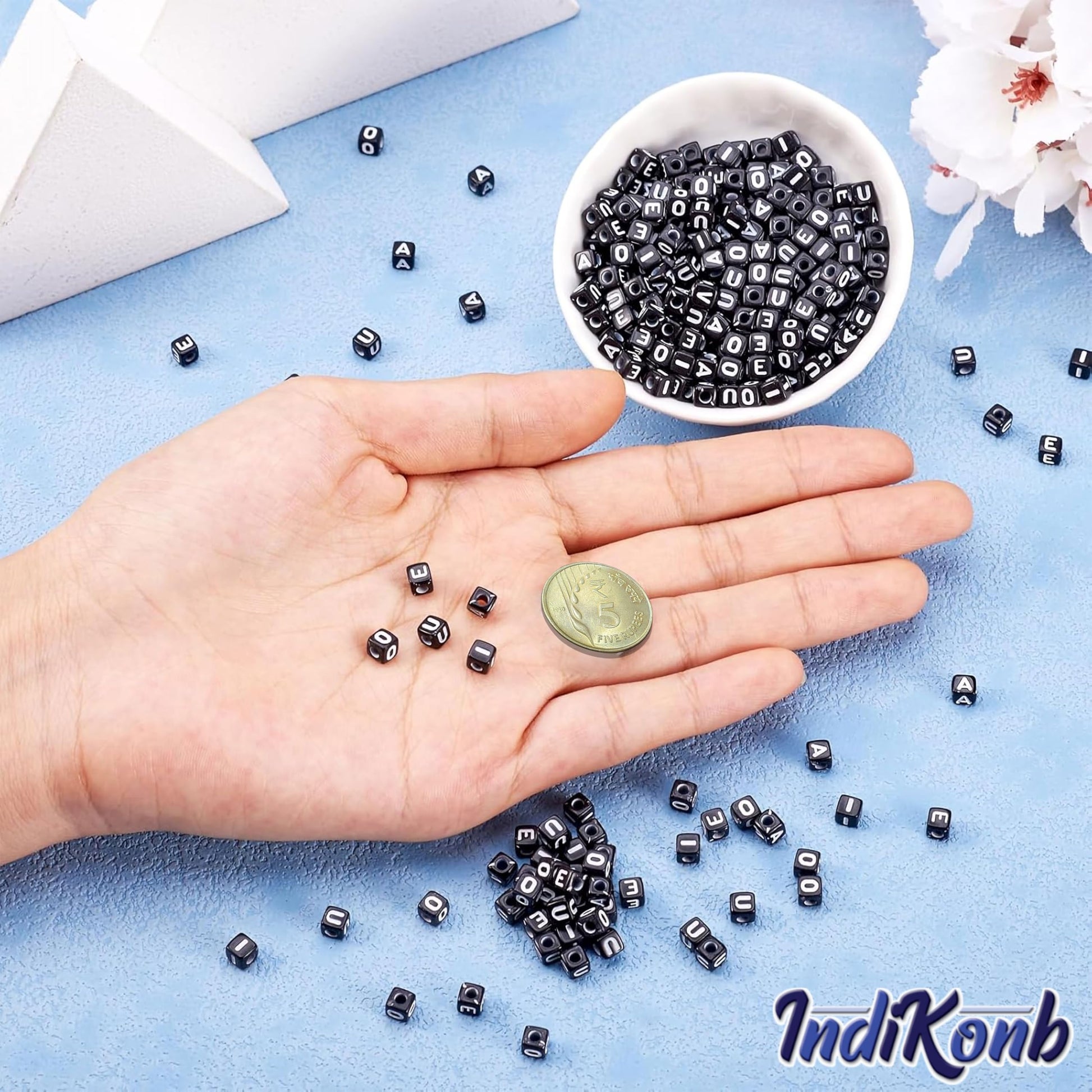 Use white black 6 mm and 6mm beads to finish DIY jewellery projects, beading craft and decorative craft finishing with a neat decorative finish.