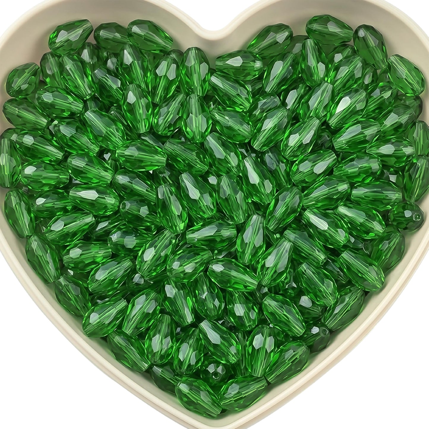 Add graceful dangle accents to earrings and charms with 15x10mm dark green faceted teardrop beads.