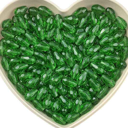 Add graceful dangle accents to earrings and charms with 15x10mm dark green faceted teardrop beads.