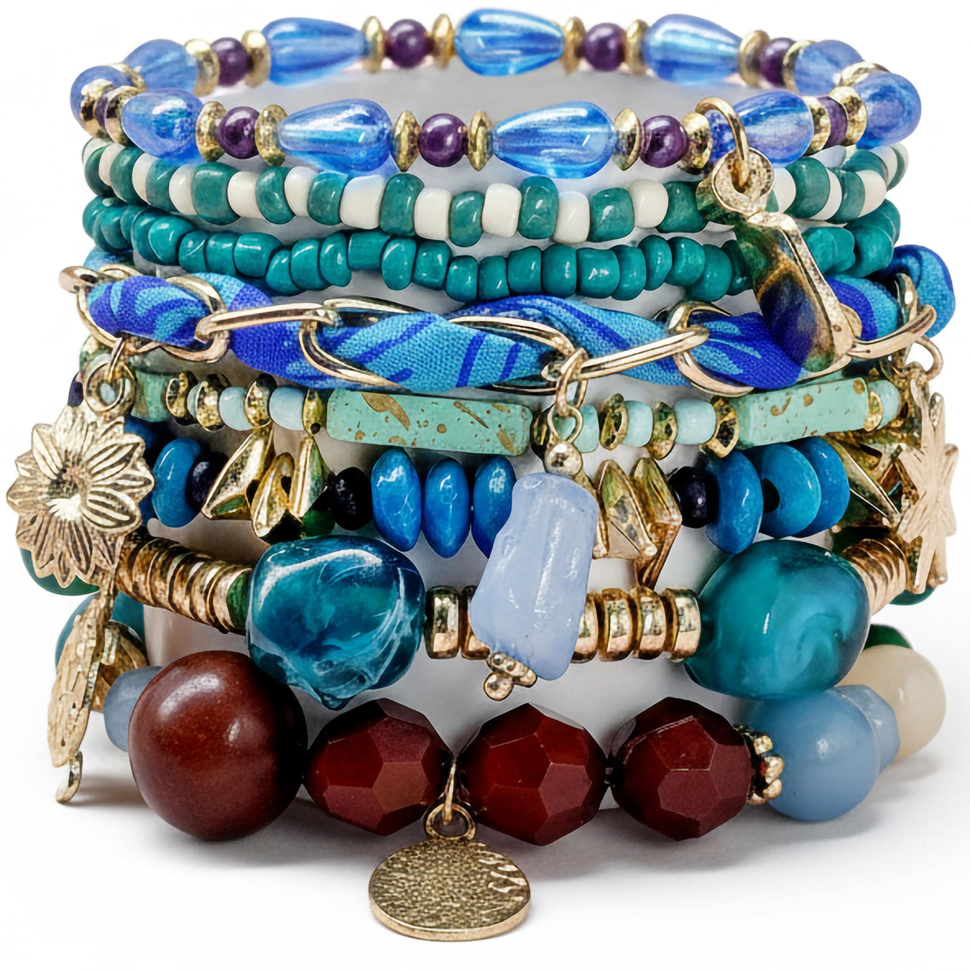 Bring beachy boho charm to wrist stacks with a sky blue beaded bracelet set and shell accents.