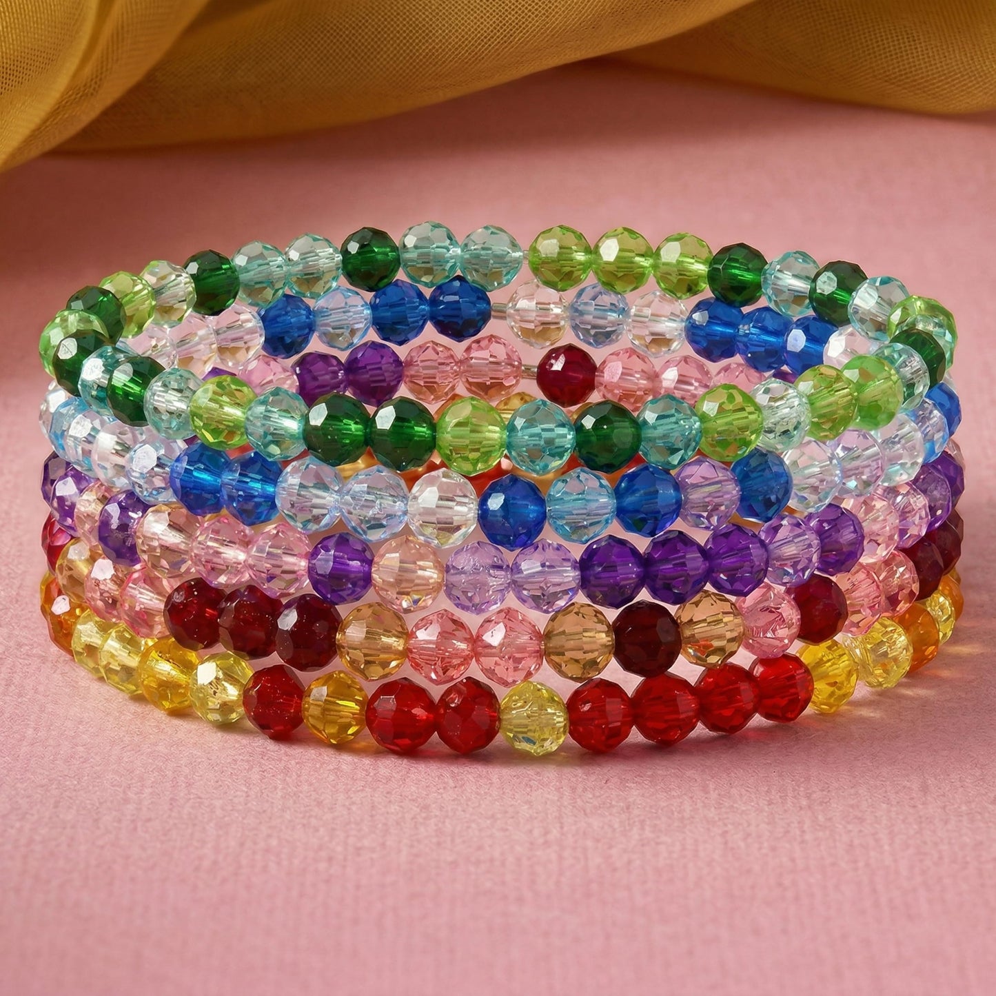Bring a polished bead finish to casual outfits with a multicolor faceted bracelet set.
