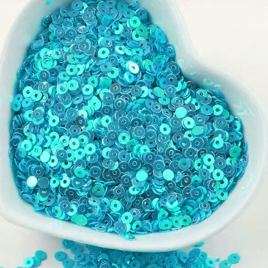 Sky blue 4mm sequins round shape 4mm sitara sequins with holes give Embroidery for embroidery, craft decoration and fabric embellishment a neat visual lift.