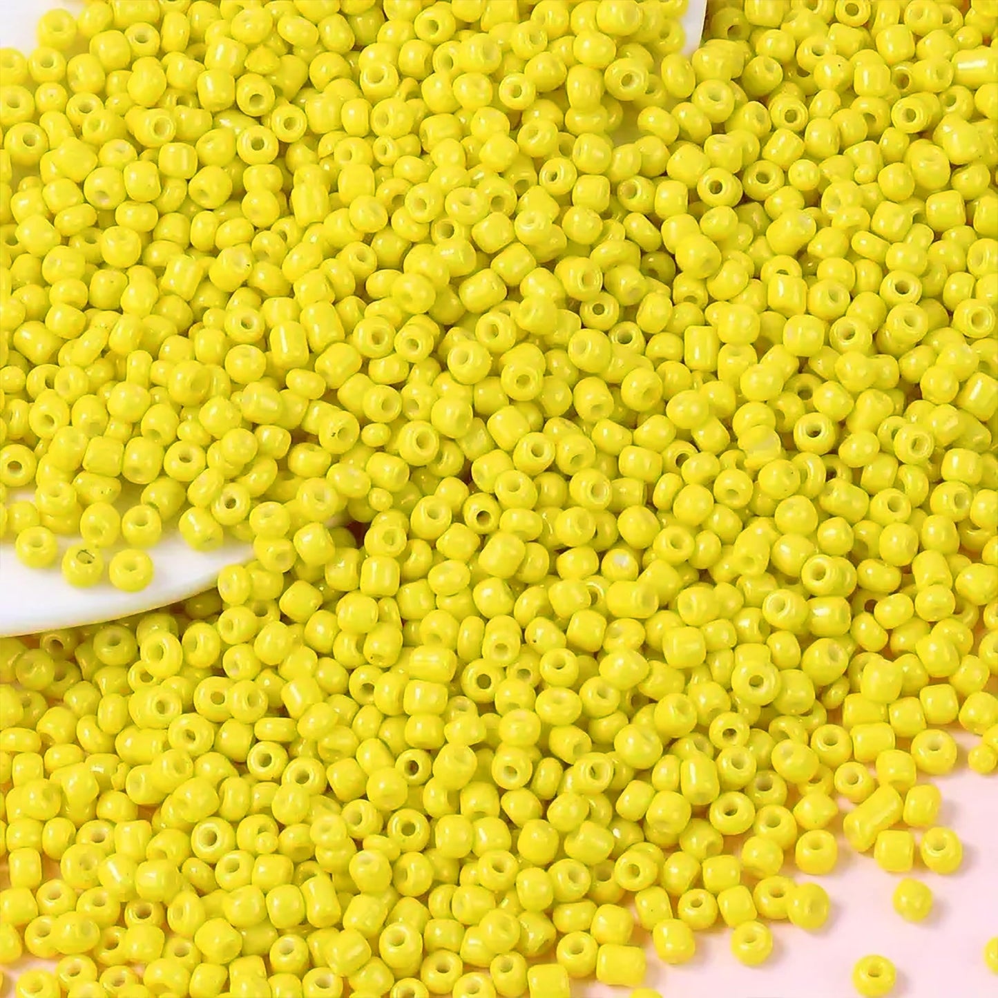 Light yellow 2mm and 02mm beads help shape a polished result for bracelet making, necklace making and DIY jewellery projects.