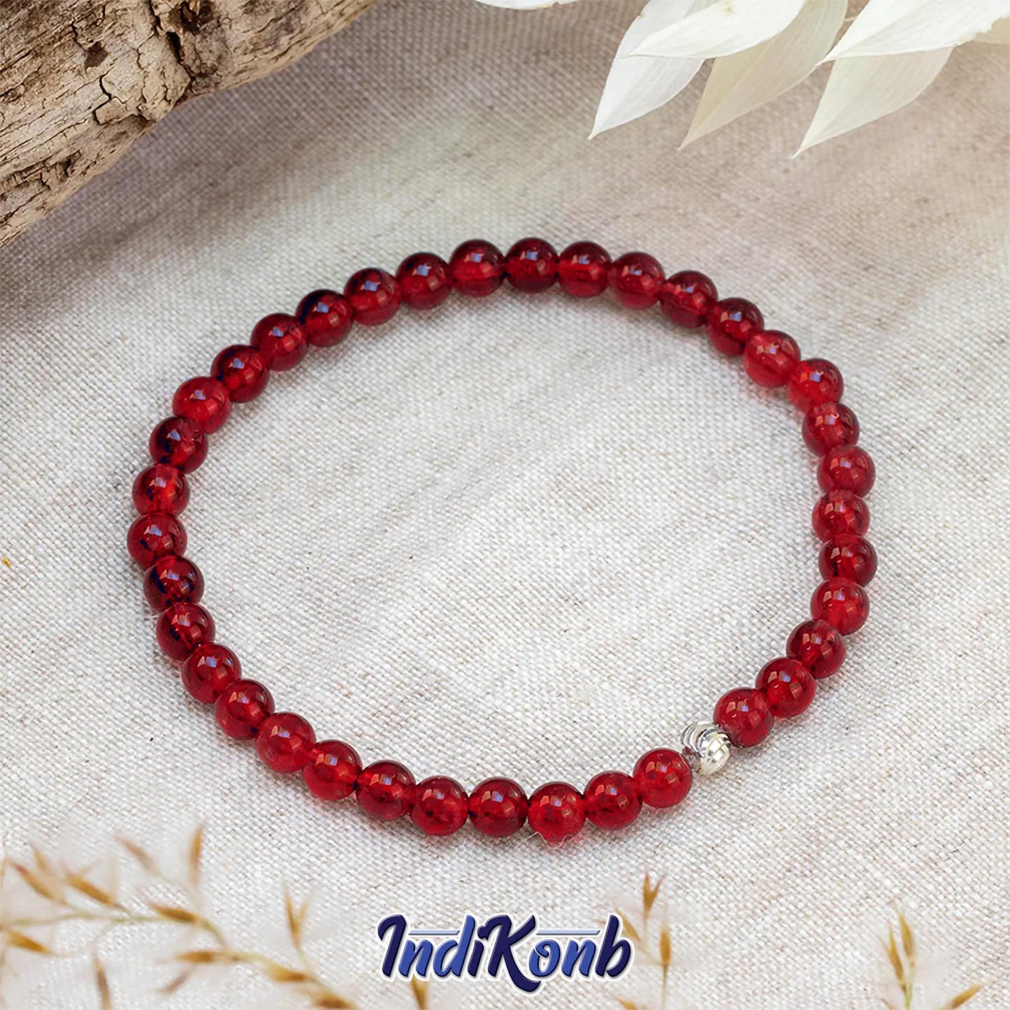 Red and multicolour 4mm beads give beading craft a neat visual lift.