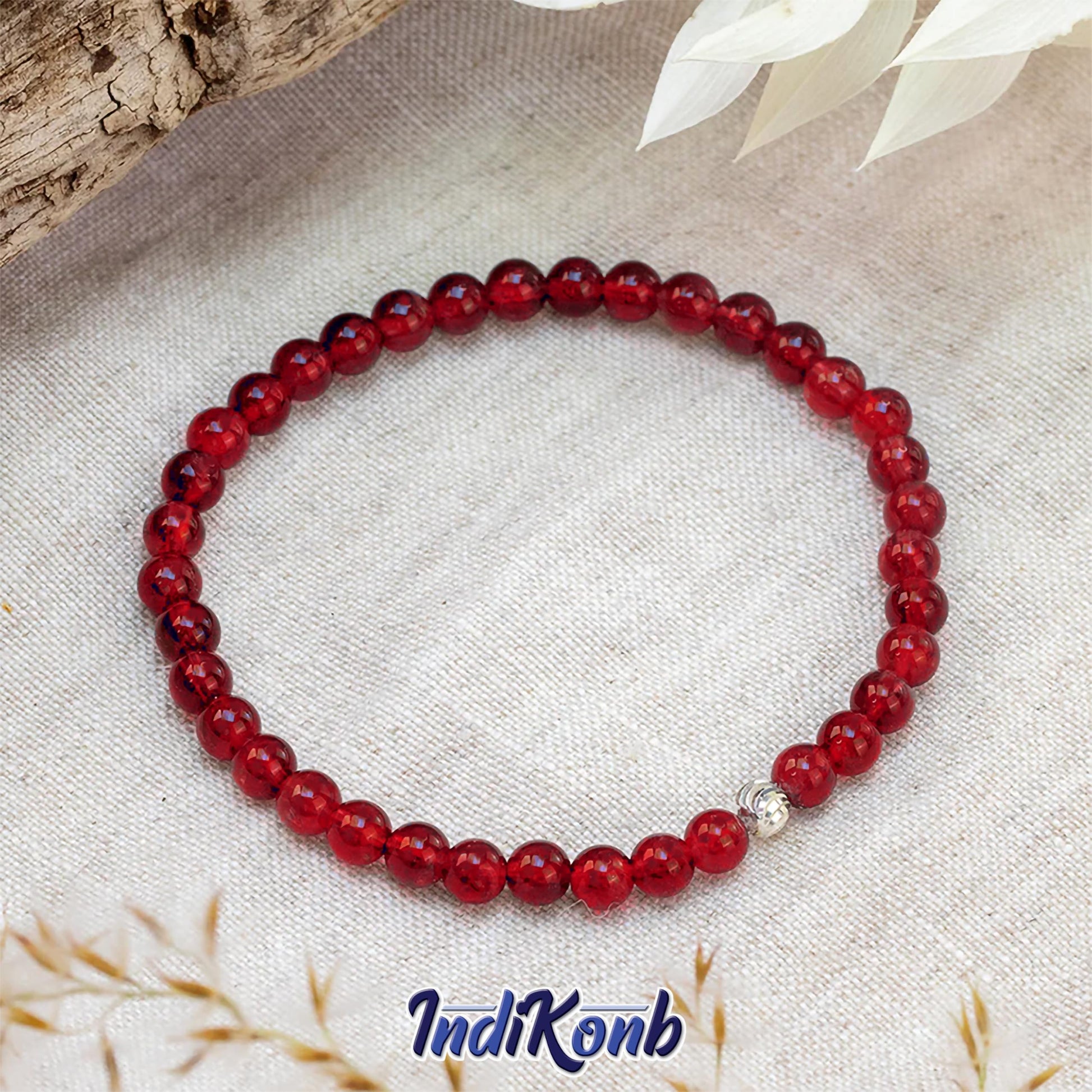 Red and multicolour 4mm beads give beading craft a neat visual lift.
