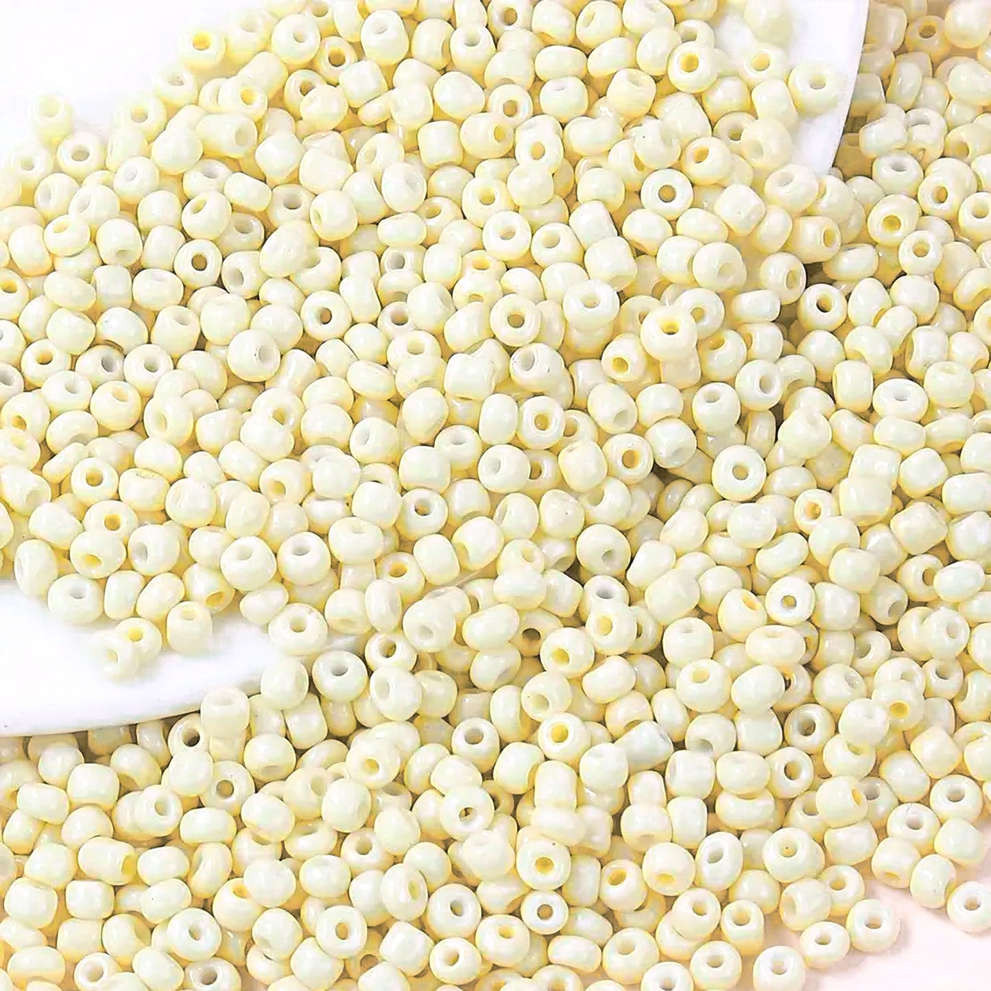 Off white 4mm and 4 mm beads give bracelet making, necklace making and DIY jewellery projects a neat visual lift.