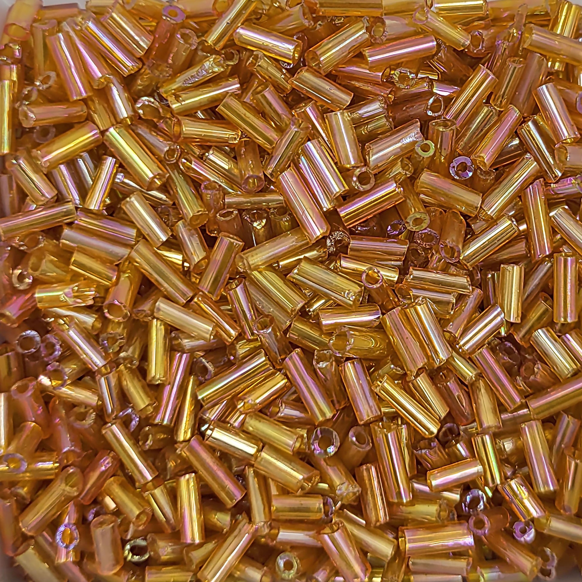 Use light brown and rainbow 5mm bugle small cut cylinder rainbow tubes 5mm shiny for DIY craft projects, creative hobby work and decorative handmade designs when the design needs a.