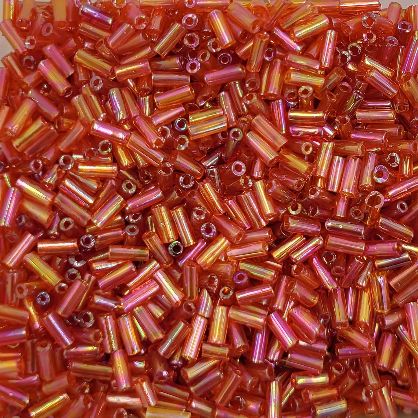 DIY craft projects, creative hobby work and decorative handmade designs can be finished with red and rainbow 5mm bugle small cut cylinder rainbow tubes 5mm shiny for clean.