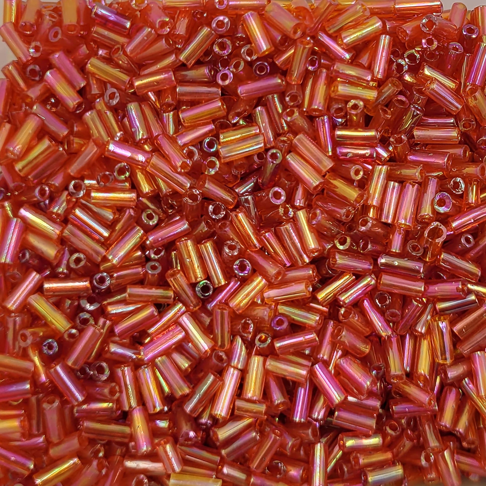 DIY craft projects, creative hobby work and decorative handmade designs can be finished with red and rainbow 5mm bugle small cut cylinder rainbow tubes 5mm shiny for clean.