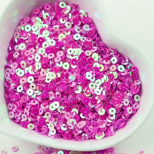 Magenta 4mm sequins round shape 4mm sitara sequins with holes make Embroidery for embroidery, craft decoration and fabric embellishment look more complete.