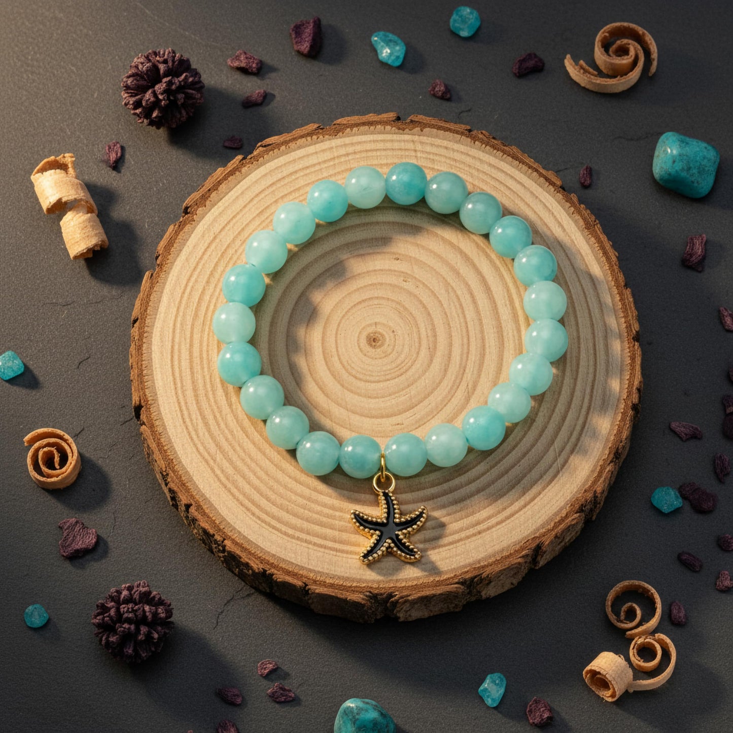 Layer cute wrist stacks with sky blue dualtone bead details and charm accents.
