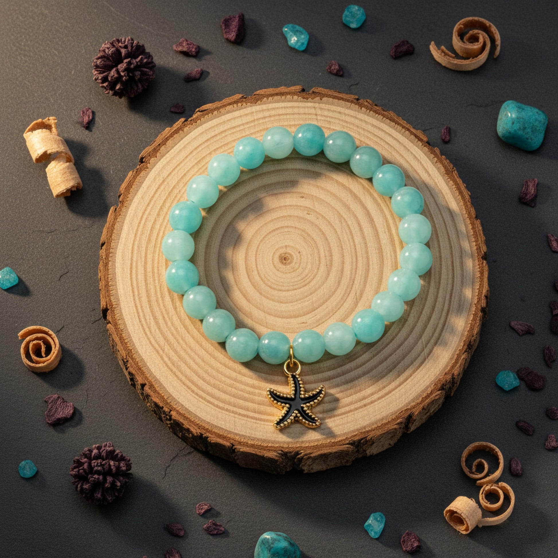 Layer cute wrist stacks with sky blue dualtone bead details and charm accents.