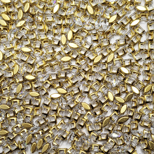 Markis 3x6 and multicolour rhinestone and stone rhinestones and flatback stones bring a polished accent to embellishment work, Lippan art and fabric decoration.
